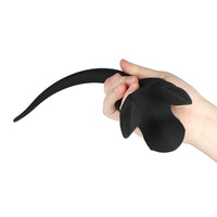 The 11" - 12" Black Silicone Dog Tail is huge for dog lovers into sex play. Its tail is stiff, and the silicone sex toy may require stretching.