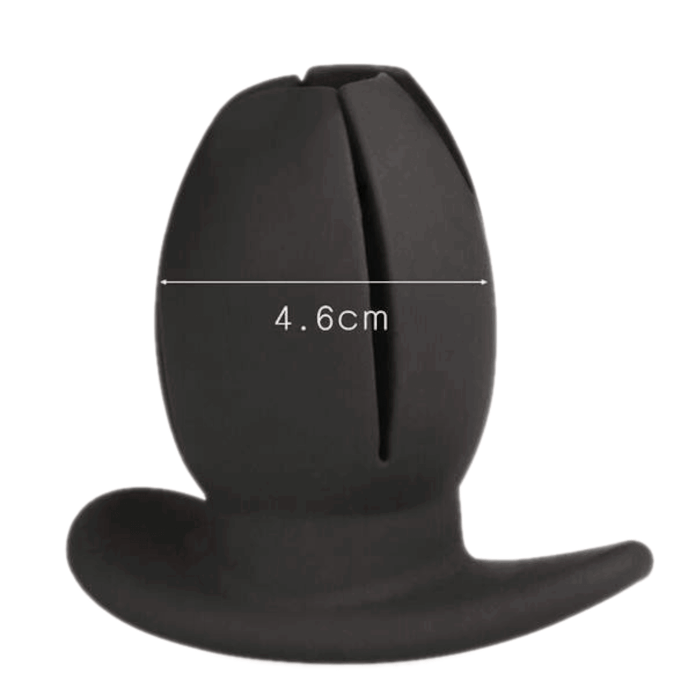 Experience intense play with this silicone, hollow sex toy. The huge, tunnel expands up to 3 inches, great for inserting huge sex toys or beads.