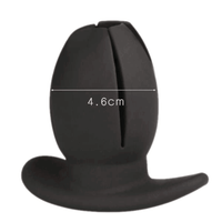 Experience intense play with this silicone, hollow sex toy. The huge, tunnel expands up to 3 inches, great for inserting huge sex toys or beads.