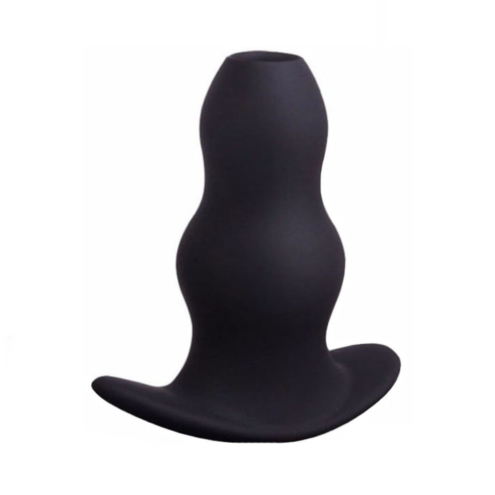 The silicone dilator, large, soft, enema plug offers an open hole for extra sensations. Great for intermediate users of butt hollow sex toys.