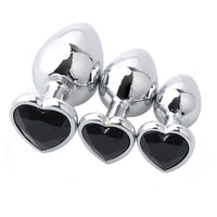 Feel sexy and sophisticated with jewelry-shaped sex toys princess adorned by a black, jeweled metal heart, offering an ash-silver look.