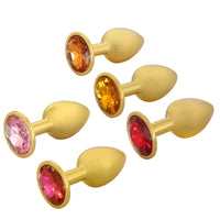 Slip into discreet luxury with this gold-plated, stainless plug. Plug jewel Comes in pink, black, red, blue, and is great for beginners.