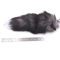 Feel the sensual touch of the soft fox, fur, tail as you explore new sensations with the animal sex toy, paired with a sleek vibrator.