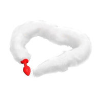 Slip into your wildest fantasies with this white cat tail, the fur delicately brushing as the sex toys tail teases, the woman moans while the cock fills her tightly.