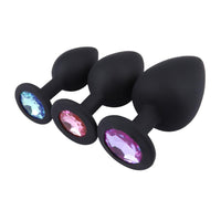 Feel sexy with these jeweled, rainbow, pink, silicone, training plugs. Shaped for princess sex toy lovers and black plug options!