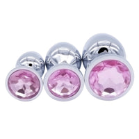 Experience luxurious play with stainless steel metal sex toys, featuring faux jeweled accents and smooth silver finish.