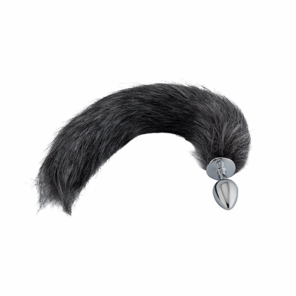 An elegant image featuring a sleek sex toys tail with a soft faux fox tail. Ideal for cosplay or intense play, it won't detach easily and works great with cat roles.