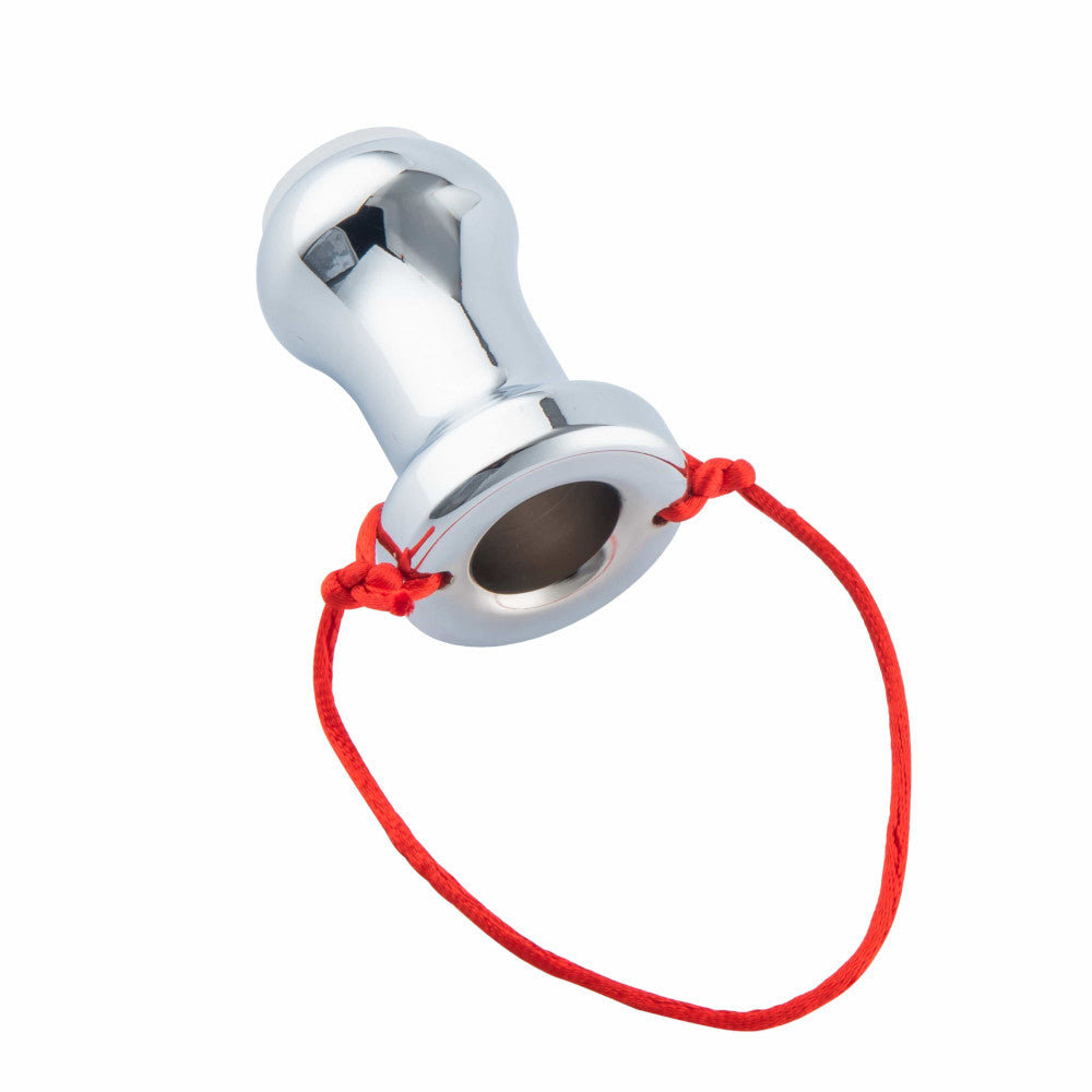 For a unique experience, use this stainless steel, hollow sex toy hollow for gaping. The metal, tunnel, and silicone-free feel enhances temperature play.