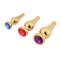 The jeweled plugs offer a sleek feel with a tapered shape for comfortable exploration, training butt, and the metal adds a luxurious touch. Blue, Clear, Gold, Metal, Purple, Red.