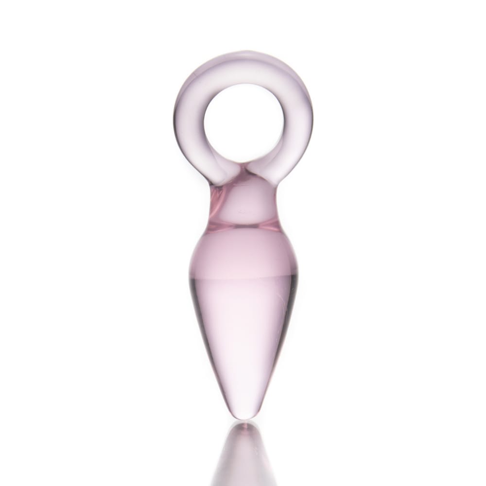 Experience bliss with this pink kunai-shaped glass plug. The Plugs small tip ensures easy insertion, offering unparalleled sensations. Perfect for those seeking something new in their glass play!