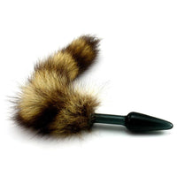 Eco-friendly glass, black, and green sex toy paired with a soft fur tail is perfect for temperature play. sex toy raccoon adds a wild touch.