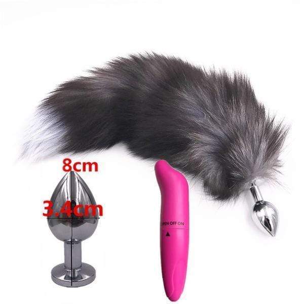 Indulge your wild side with this fur fox tail, combining a black vibrator for added pleasure. tail