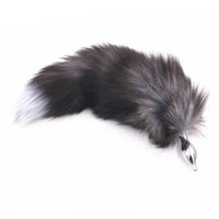 Enhance your experience with a bushy fox tail, vibrator, and smooth sex toys for an unforgettable night.