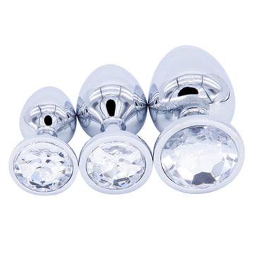 The stainless, small butt steel toy adorned with a faux jewel adds a touch of elegance to any session. Crafted in silver for a luxurious feel.