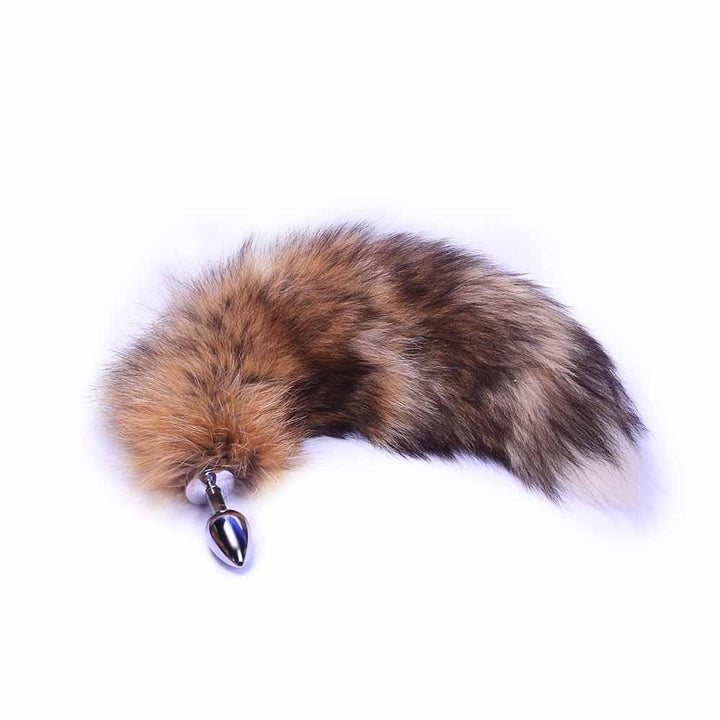 The light touch of the fox butt, tail against your skin brings out your wild side. Its soft, brown faux fur adds a unique allure.