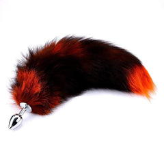 Unleash your fiery hot vixen with this fox tail cat plug, made from silicone, and imagine ears flicking, black fur, and orange flames.
