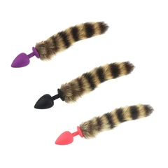 Embrace your wild side with a raccoon sex toy. The fur, brown and black, complements your animal instincts as you wear the tail, ear, and sex toy.