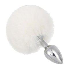 The image showcases bunny sex toys with a fluffy white tail and stainless steel sex toy. The ears, tail, and sex toy complement each other seamlessly.